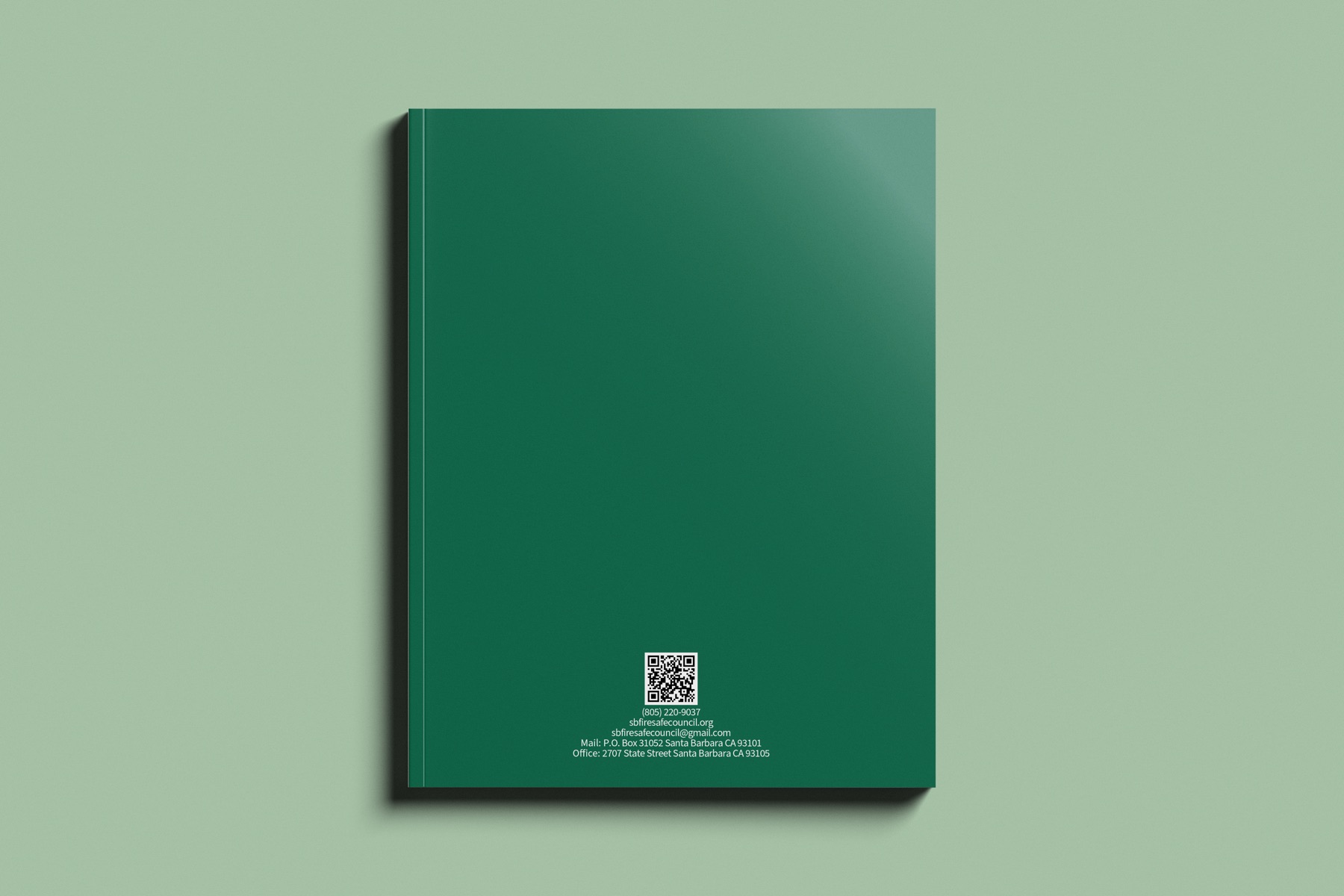 The back cover in solid green with the council address and a QR code