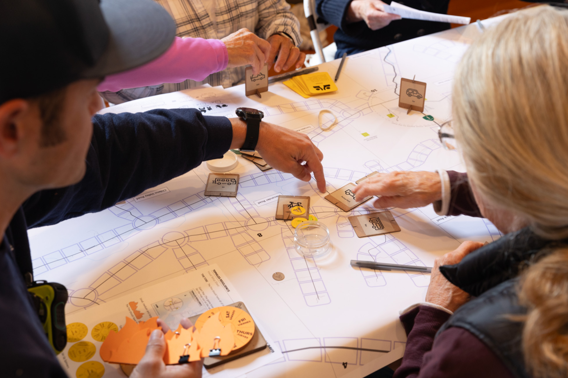 Prototyping Resilience wildfire evacuation board game in play